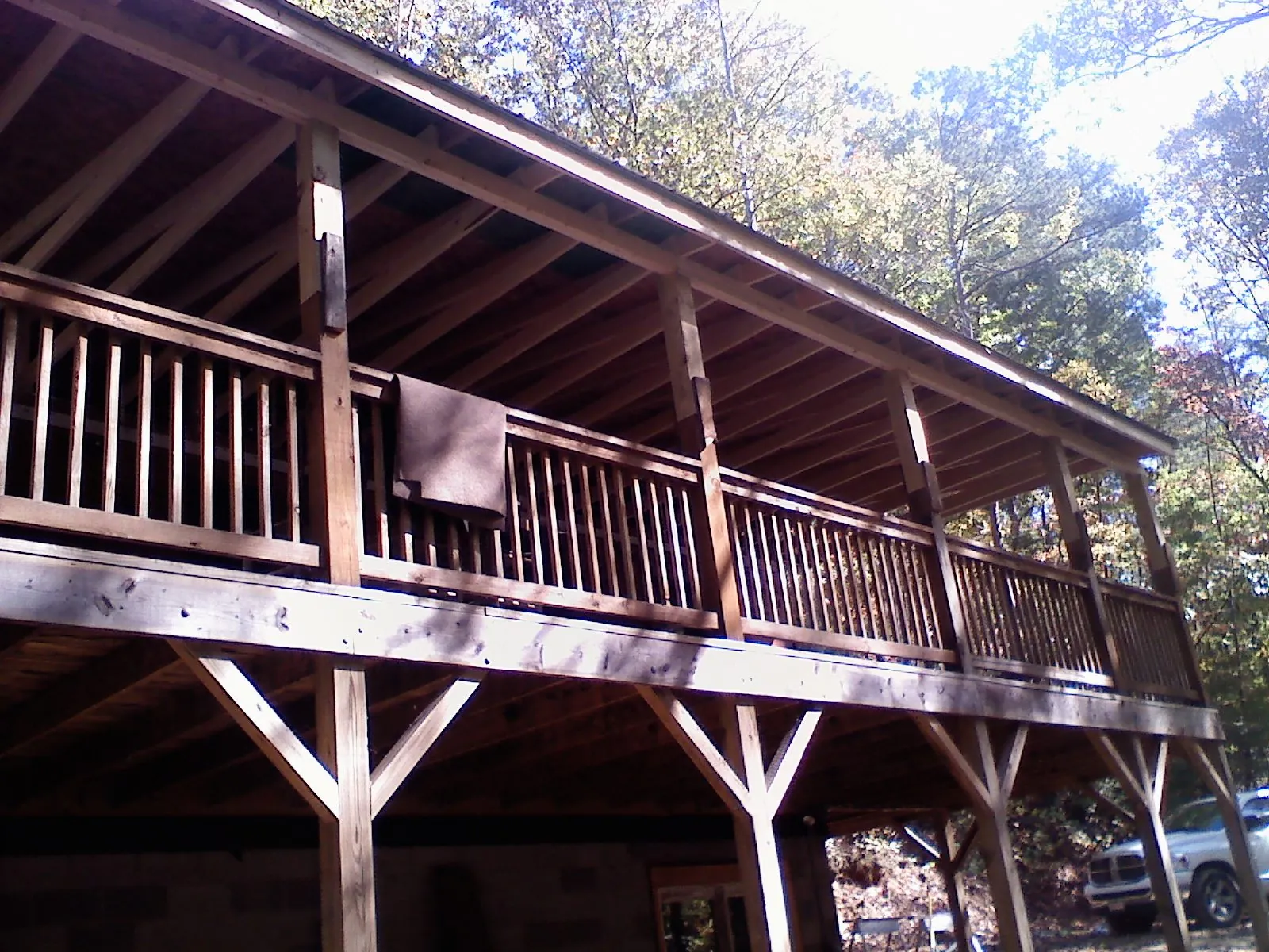 Timber framing under a new elevated porch and deck — Roof Leak Repair in Baltimore by Roofing Brothers